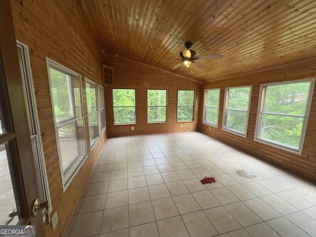 492 Garmon Rd, Cedartown, GA 30125 - unfurnished sunroom with lofted ceiling, wooden walls, a healthy amount of sunlight, and tile patterned floors