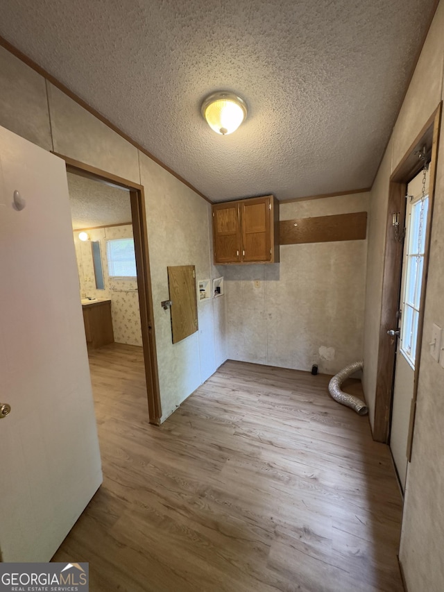 492 Garmon Rd, Cedartown, GA 30125 - laundry area with a textured ceiling and wood finished floors