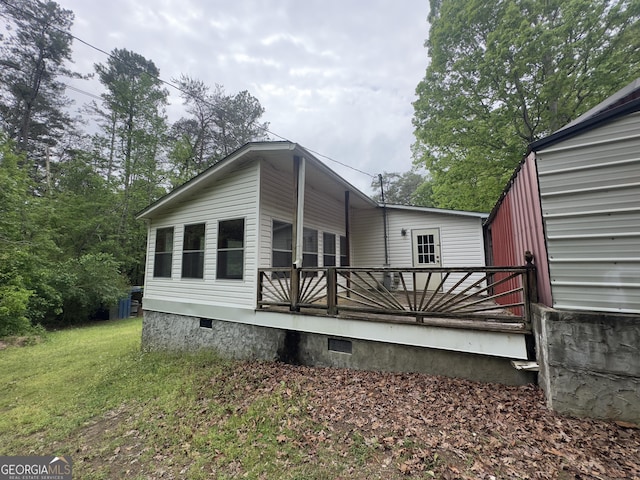 492 Garmon Rd, Cedartown, GA 30125 - back of property with a yard, crawl space, and a wooden deck