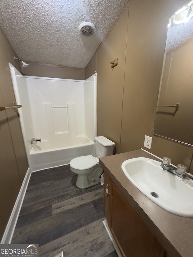 492 Garmon Rd, Cedartown, GA 30125 - full bathroom with vanity, visible vents, a textured ceiling, and wood finished floors