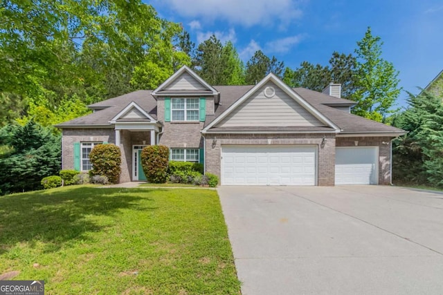 craftsman-style house featuring concrete driveway, brick siding, a garage, and a front lawn