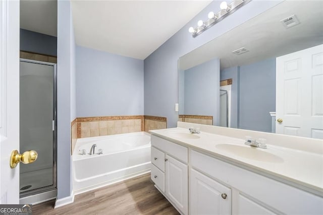 3366 Thornbridge Dr, Powder Springs, GA 30127 - full bath with visible vents, a sink, a bath, and a shower stall