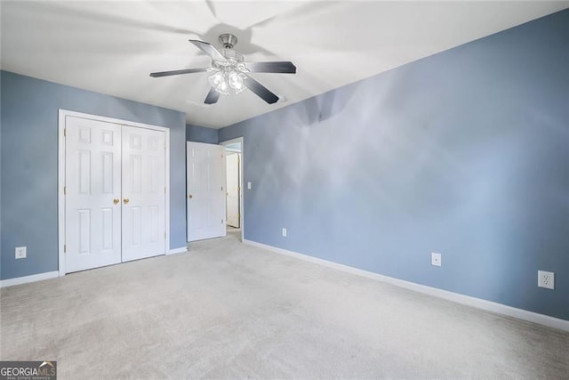 3366 Thornbridge Dr, Powder Springs, GA 30127 - unfurnished bedroom with baseboards, carpet, and a closet