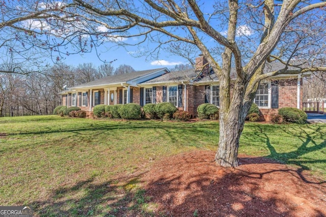 417 Pulliam Ln, Royston, GA 30662 - ranch-style home featuring a front lawn and brick siding