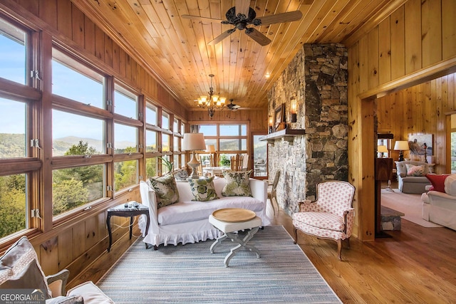 295 Goble Gap Rd, Clayton, GA 30525 - sunroom featuring wooden ceiling, wooden walls, wood finished floors, and a chandelier