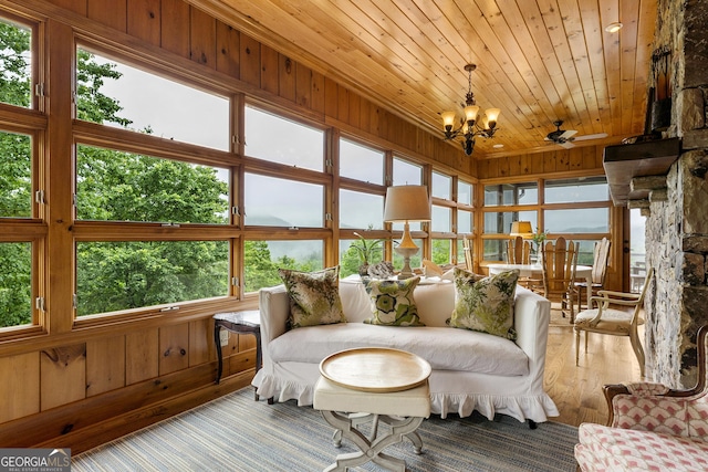 295 Goble Gap Rd, Clayton, GA 30525 - sunroom / solarium featuring wooden ceiling, a chandelier, wood finished floors, healthy amount of natural light, and wood walls