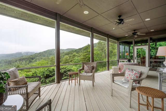 295 Goble Gap Rd, Clayton, GA 30525 - sunroom with ceiling fan, a view of trees, and a mountain view