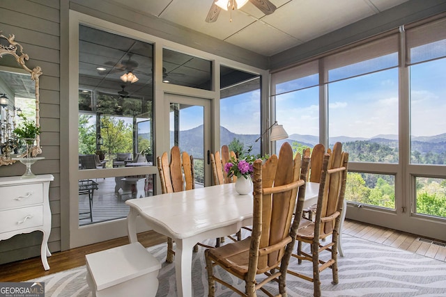 295 Goble Gap Rd, Clayton, GA 30525 - sunroom with wood finished floors, a mountain view, and plenty of natural light
