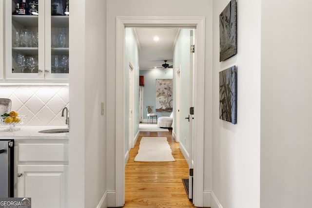 295 Goble Gap Rd, Clayton, GA 30525 - hallway featuring light wood finished floors and a sink