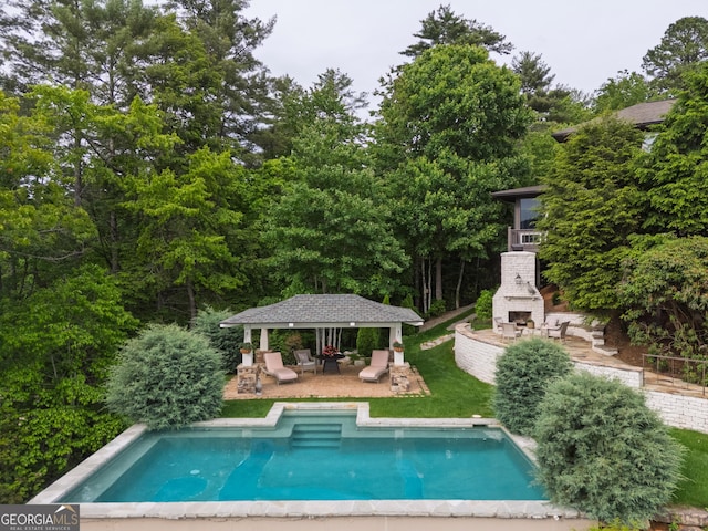 295 Goble Gap Rd, Clayton, GA 30525 - outdoor pool featuring a patio, a gazebo, and an outdoor living space with a fireplace