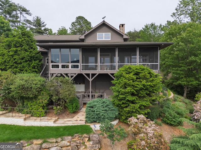 295 Goble Gap Rd, Clayton, GA 30525 - rear view of house featuring a sunroom and a chimney