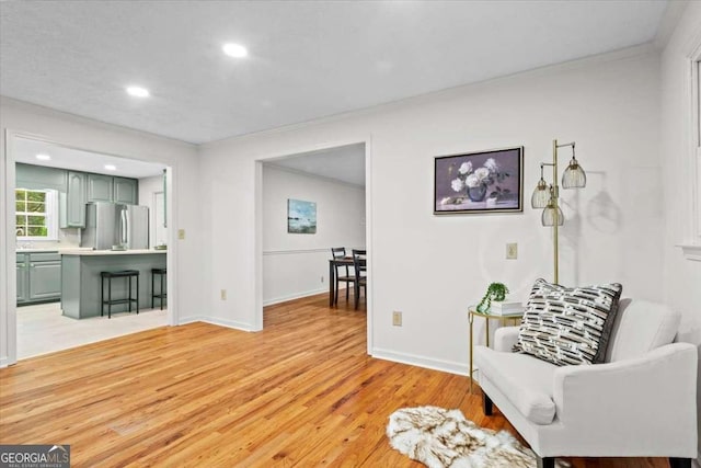 5766 Macland Rd, Powder Springs, GA 30127 - living area with light wood-style floors, recessed lighting, and crown molding