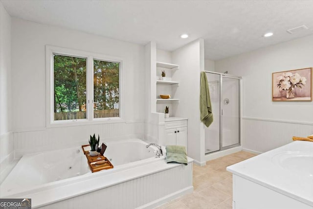 5766 Macland Rd, Powder Springs, GA 30127 - bathroom with a shower stall, a whirlpool tub, tile patterned flooring, vanity, and recessed lighting