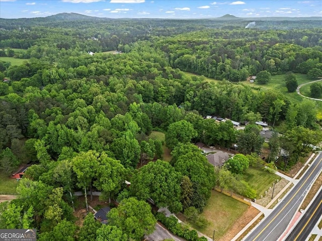 5766 Macland Rd, Powder Springs, GA 30127 - aerial view of property and surrounding area with a heavily wooded area and mountains