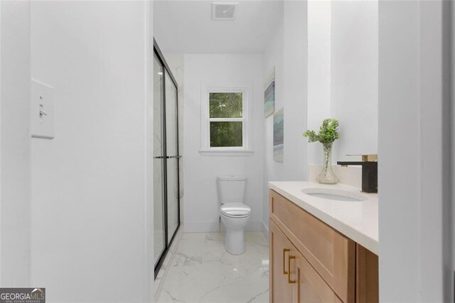 full bathroom featuring a shower stall, vanity, marble finish floor, toilet, and visible vents