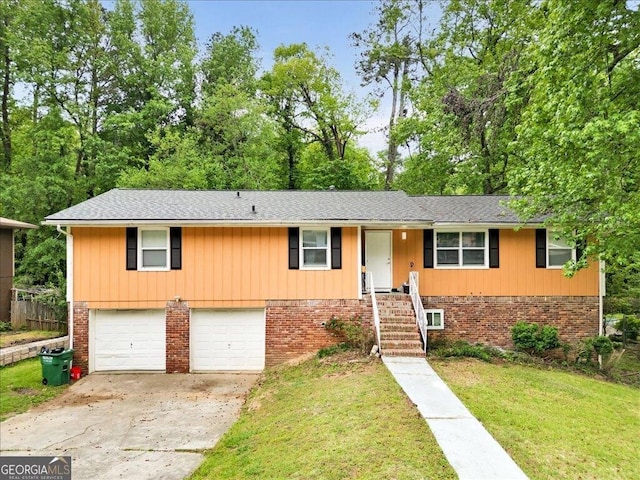 ranch-style home with concrete driveway, a shingled roof, an attached garage, brick siding, and a front lawn