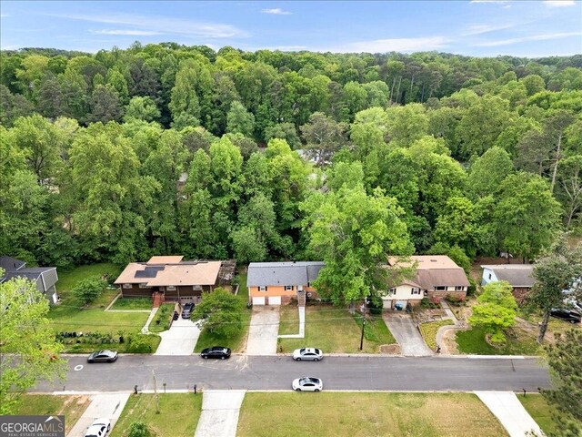 bird's eye view featuring a view of trees