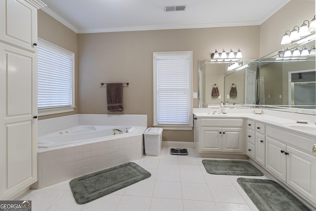 bathroom with tile patterned flooring, visible vents, a sink, crown molding, and a garden tub