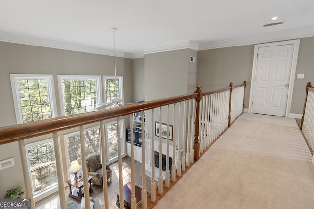 corridor with visible vents, recessed lighting, an upstairs landing, and crown molding