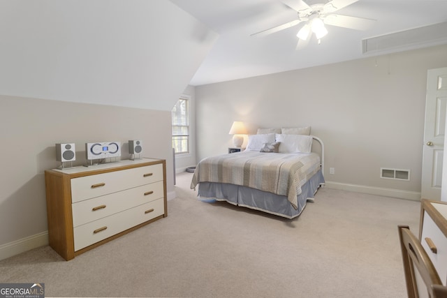 bedroom featuring attic access, visible vents, baseboards, and light carpet