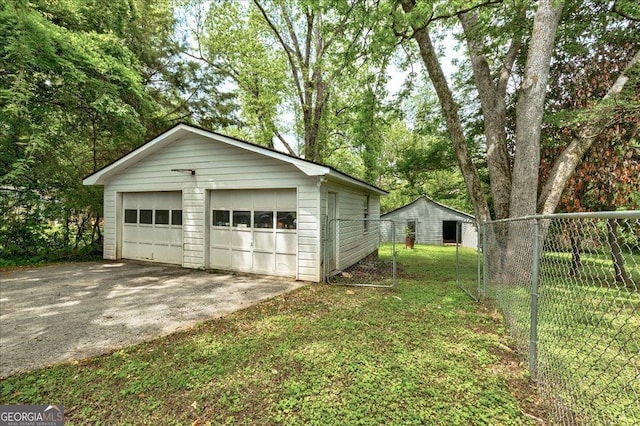 19 Mcdonough St, Hampton, GA 30228 - detached garage featuring fence