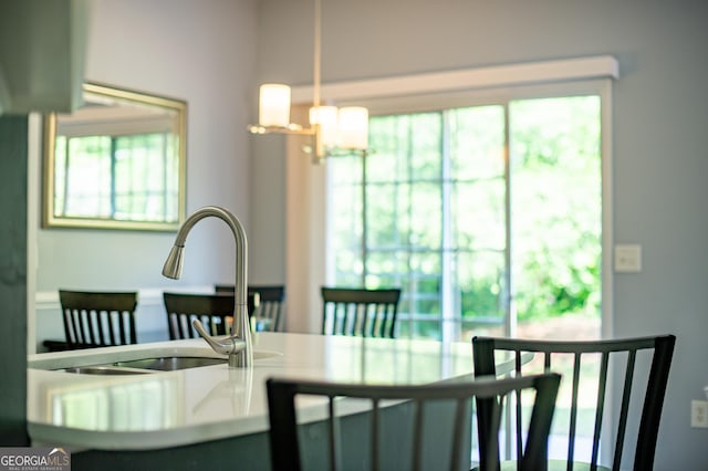 dining area with a notable chandelier