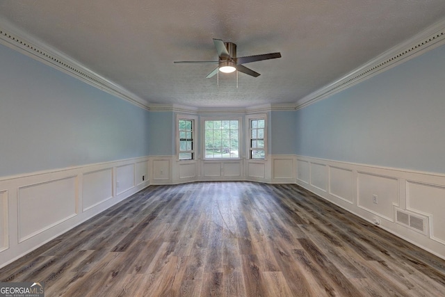 5621 Wildwood Trl, Lithonia, GA 30038 - spare room with ceiling fan, a decorative wall, and ornamental molding