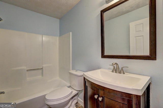 5621 Wildwood Trl, Lithonia, GA 30038 - bathroom with a textured ceiling, toilet, and vanity