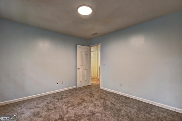 5621 Wildwood Trl, Lithonia, GA 30038 - carpeted empty room with baseboards and visible vents