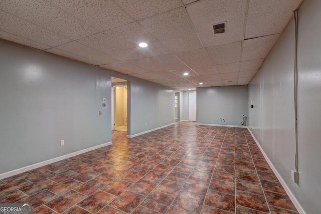 5621 Wildwood Trl, Lithonia, GA 30038 - finished below grade area with baseboards, a paneled ceiling, and recessed lighting