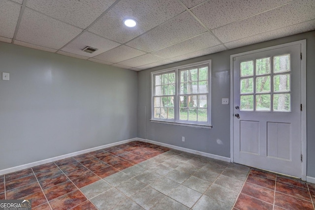5621 Wildwood Trl, Lithonia, GA 30038 - doorway featuring baseboards, visible vents, tile patterned floors, and a drop ceiling