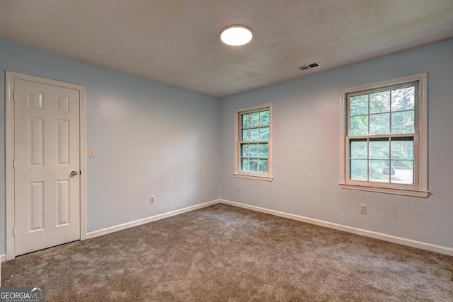 5621 Wildwood Trl, Lithonia, GA 30038 - empty room with carpet, visible vents, and baseboards