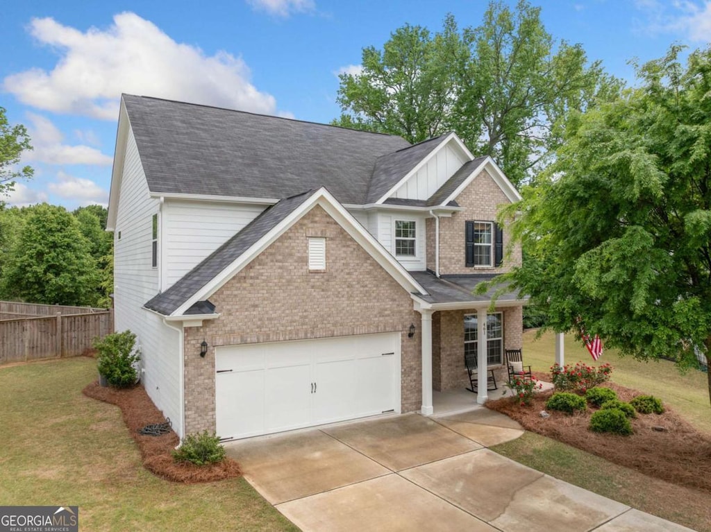 461 Timberleaf Rd, Canton, GA 30115 - view of front of home featuring brick siding, fence, driveway, and a front yard
