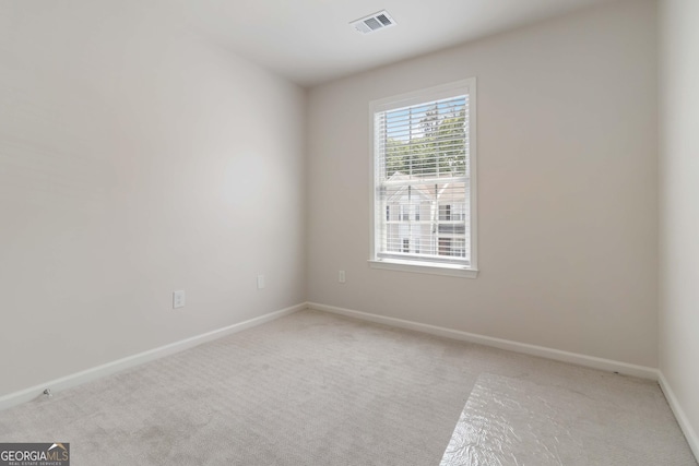 13300 Morris Rd Unit 76, Milton, GA 30004 - empty room featuring light carpet and baseboards