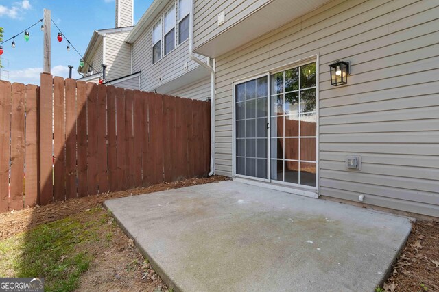 view of patio / terrace with fence