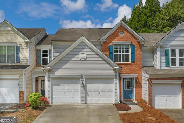 4205 Royal Regency Cir NW, Kennesaw, GA 30144 - townhome / multi-family property featuring brick siding and driveway