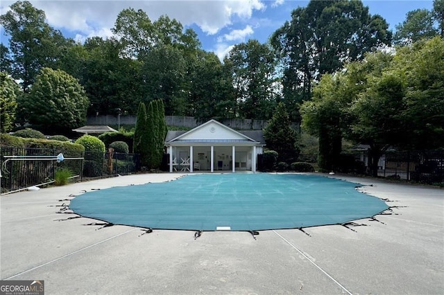 4205 Royal Regency Cir NW, Kennesaw, GA 30144 - community pool featuring a patio and view of scattered trees