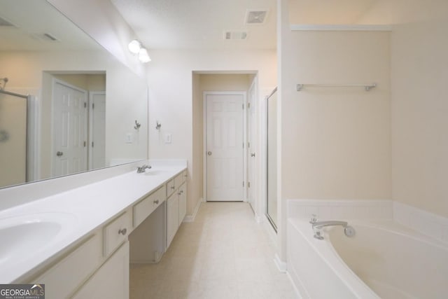 4205 Royal Regency Cir NW, Kennesaw, GA 30144 - bathroom with a stall shower, double vanity, and a garden tub