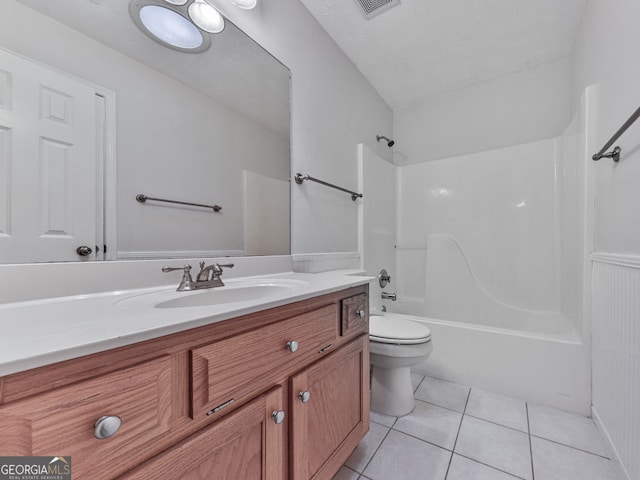 bathroom with visible vents, tub / shower combination, toilet, tile patterned floors, and vanity