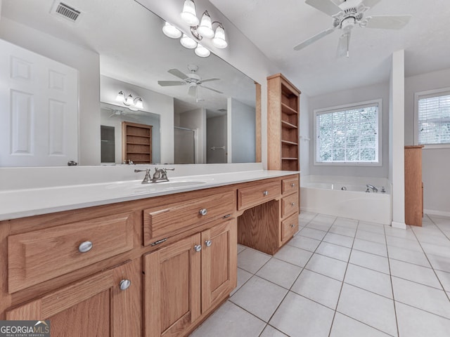 bathroom with vanity, tile patterned floors, a ceiling fan, visible vents, and a garden tub