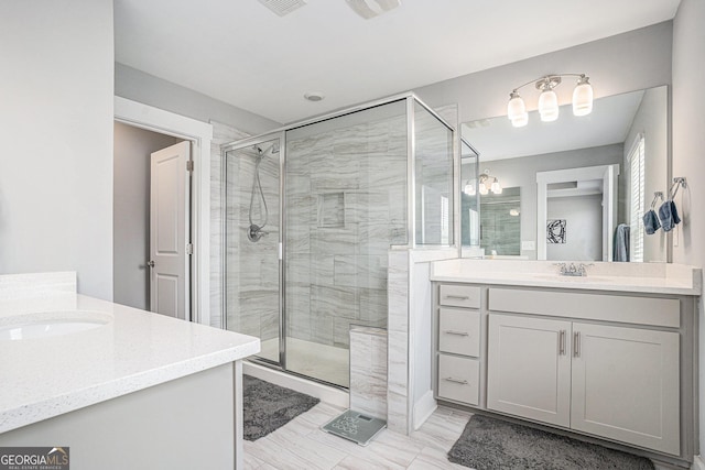 1702 Prospect Way, Conyers, GA 30094 - full bathroom featuring a shower stall, two vanities, and a sink