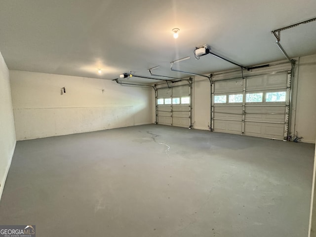 garage featuring a garage door opener