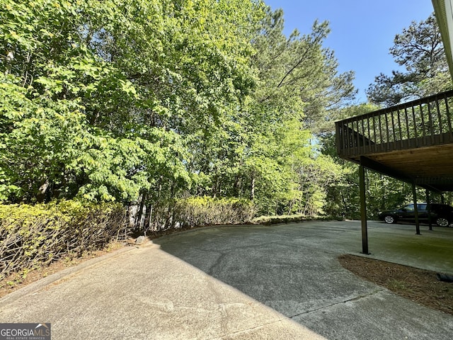 view of yard with a wooden deck