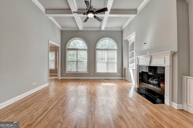 unfurnished living room featuring a fireplace, baseboards, light wood-type flooring, a ceiling fan, and coffered ceiling