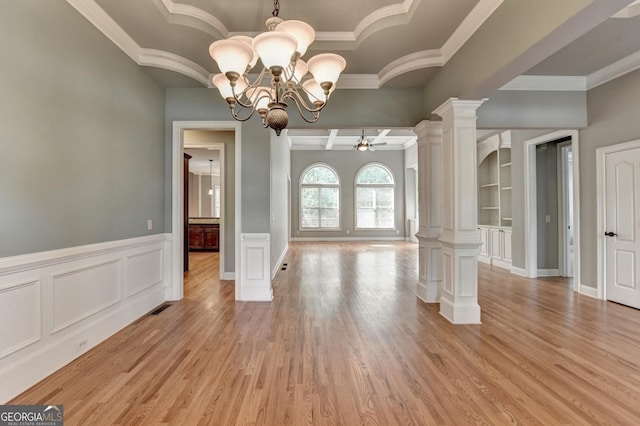unfurnished dining area with ornamental molding, ornate columns, visible vents, and a notable chandelier