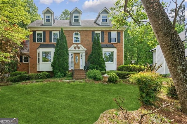 22 Oakwood Hills Dr, Suwanee, GA 30024 - georgian-style home featuring a front lawn and brick siding