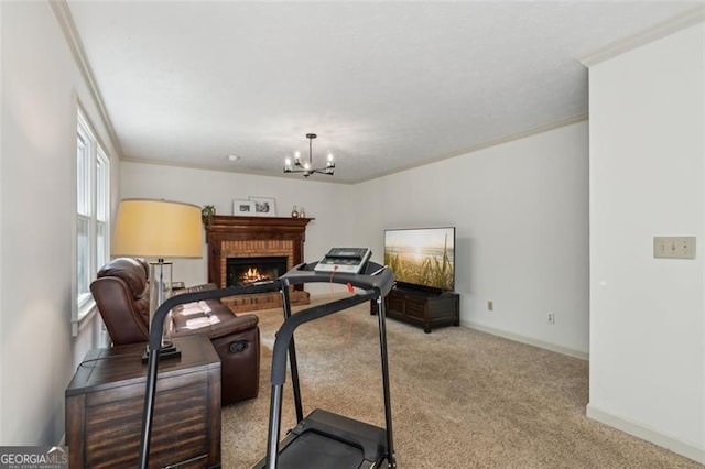 22 Oakwood Hills Dr, Suwanee, GA 30024 - workout room with ornamental molding, a brick fireplace, baseboards, carpet flooring, and a notable chandelier