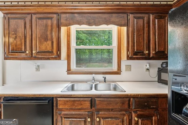 22 Oakwood Hills Dr, Suwanee, GA 30024 - kitchen featuring a sink, light countertops, and black appliances