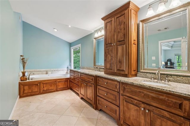 22 Oakwood Hills Dr, Suwanee, GA 30024 - bathroom featuring a sink, tile patterned flooring, double vanity, lofted ceiling, and visible vents
