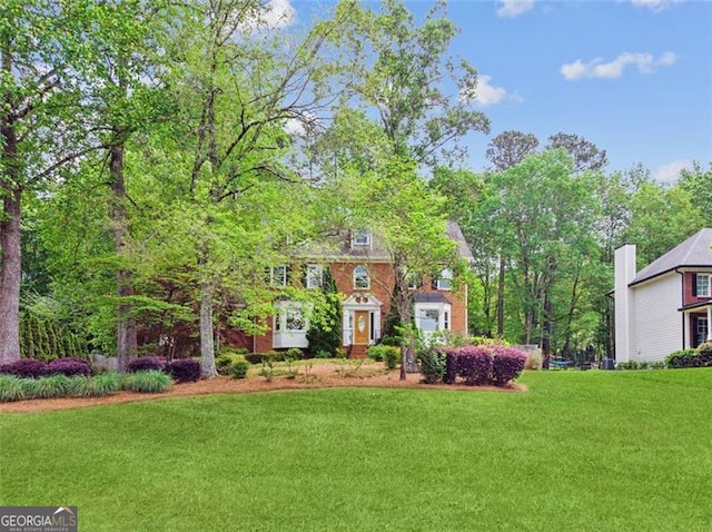 22 Oakwood Hills Dr, Suwanee, GA 30024 - colonial home with a front lawn